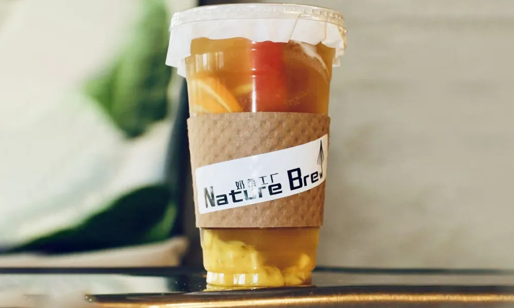 Fruit tea with fresh fruit chunks at Nature Brew, a Bubble Tea Store in Plano.