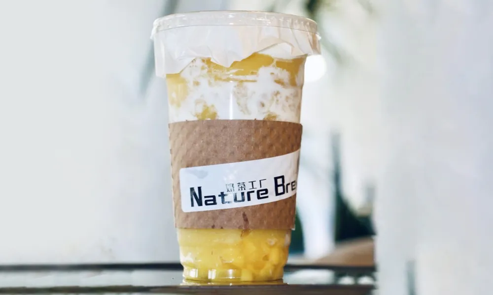 Creamy mango and coconut bubble tea at Nature Brew, a Bubble Tea Store in Plano.