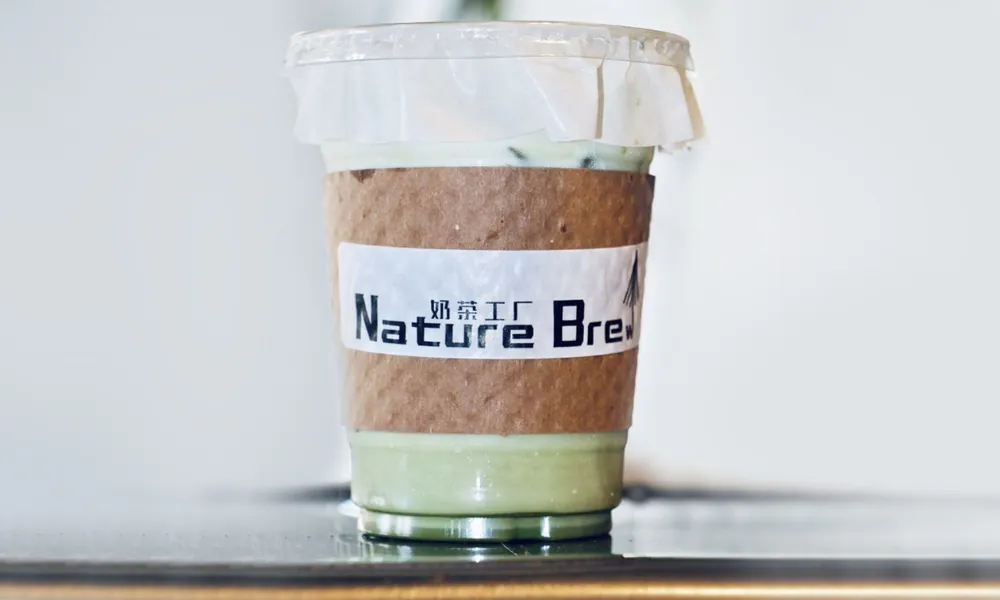 Smooth matcha and coconut latte at Nature Brew, a Bubble Tea Store in Plano.